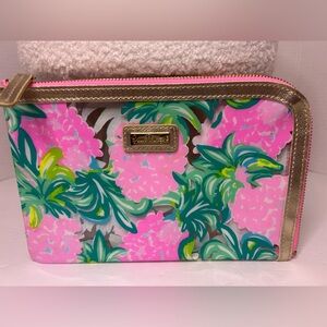 Lilly Pulitzer zippered pouch bag pink and green with gold trim and zipper pull.